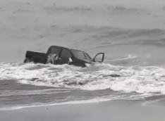 Pickup taken by tide in Coronado